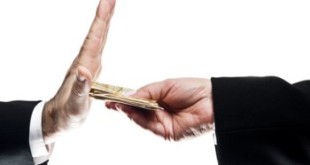 Business man refusing money offered by business woman